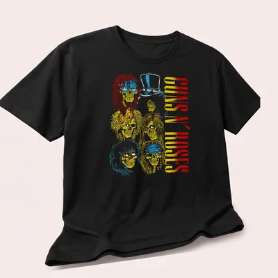 Vintage rock tee featuring Guns N' Roses skulls with long hair and a top hat. — printed on a unisex t-shirt (angled view)