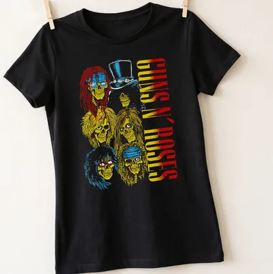 Vintage rock tee featuring Guns N' Roses skulls with long hair and a top hat. — printed on a women's shirt