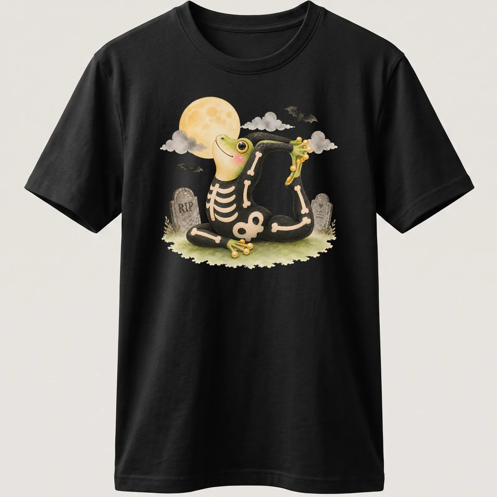 Cartoon tree frog in king pigeon yoga pose on black background with Halloween themes — printed on a unisex t-shirt