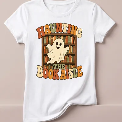 Retro ghost design with colorful lettering and whimsical imagery about books — printed on a women's shirt