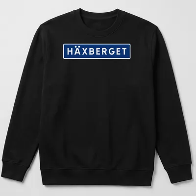 Simple modern HÄXBERGET shirt with bold blue and white lettering — printed on a unisex sweatshirt