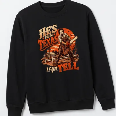 Leatherface with chainsaw t-shirt featuring vintage horror style and bold text — printed on a unisex sweatshirt