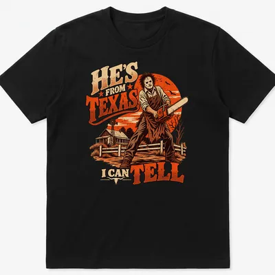 Leatherface with chainsaw t-shirt featuring vintage horror style and bold text