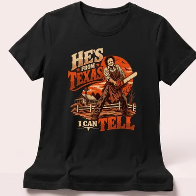 Leatherface with chainsaw t-shirt featuring vintage horror style and bold text — printed on a women's shirt