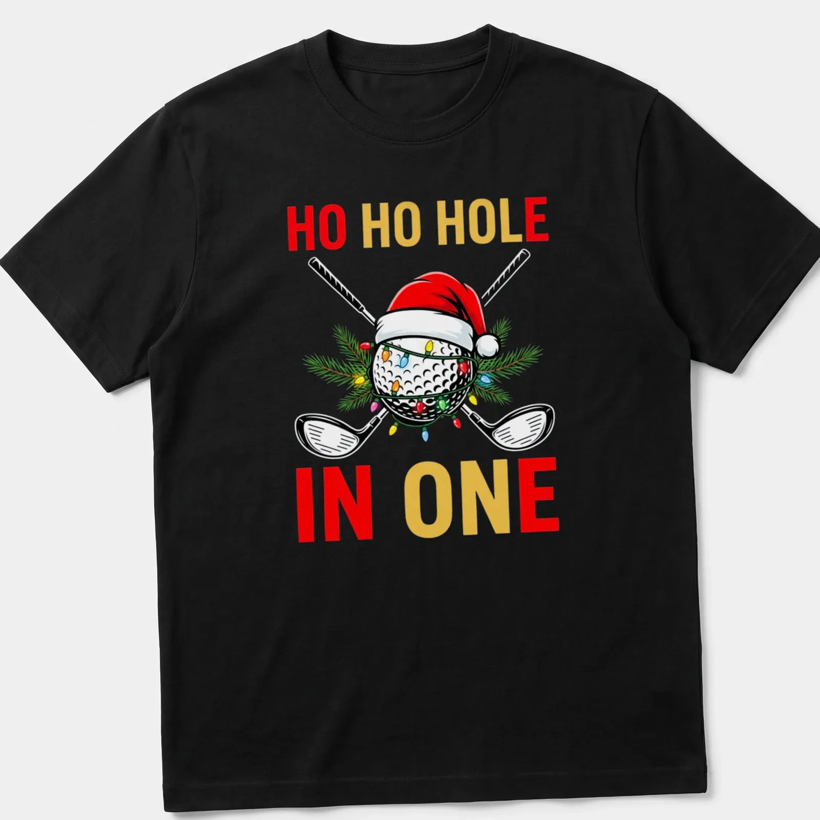 Colorful cartoon golf ball wearing a Santa hat with text 'HO HO HOLE IN ONE' — printed on a unisex t-shirt