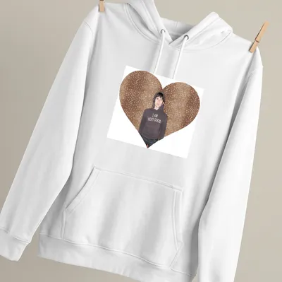 Heart-shaped design with the text 'I AM VERY GOOD' and a person in a — printed on a unisex hoodie