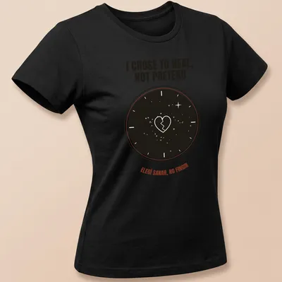 Minimalist design with a broken heart inside a clock, featuring healing text in red and black — printed on a women's shirt
