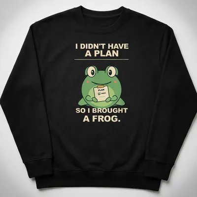 Cartoon frog with humorous text about spontaneity in green and beige — printed on a unisex sweatshirt