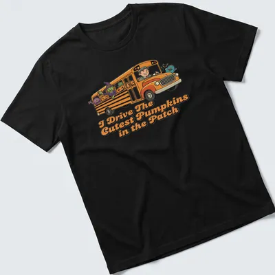 Cartoon-style shirt featuring a school bus with pumpkins and characters for Halloween.