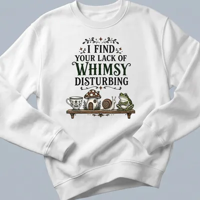 Vintage frog and snail T-shirt with whimsical text and cottage illustration — printed on a unisex sweatshirt