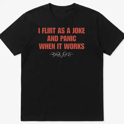 Bold typography shirt reading I Flirt As A Joke And Panic When It Works