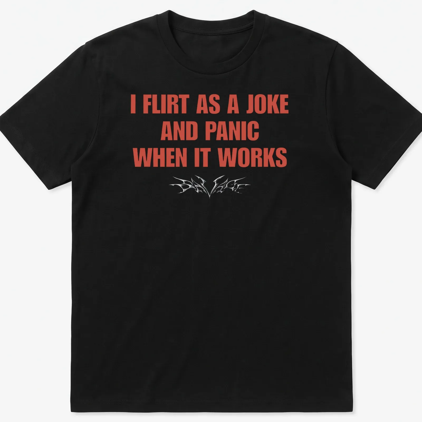Bold typography shirt reading I Flirt As A Joke And Panic When It Works — printed on a unisex t-shirt