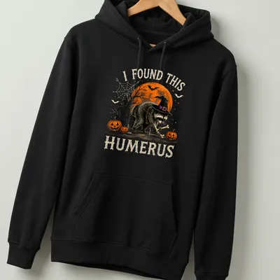 Whimsical raccoon illustration with humorous text for Halloween — printed on a unisex hoodie