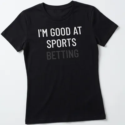 Bold typography shirt stating I'm Good At Sports Betting — printed on a women's shirt