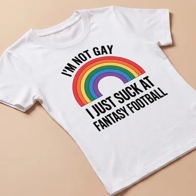 Colorful typography shirt with the phrase about fantasy football and a rainbow — printed on a women's shirt