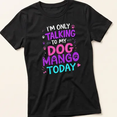 Playful tee featuring colorful text about talking to a dog named Mango — printed on a women's shirt
