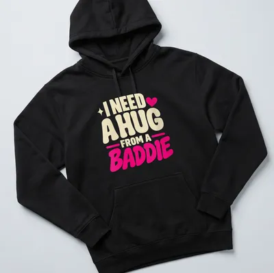 Text-based slogan t-shirt with bold lettering in cream and pink — printed on a unisex hoodie