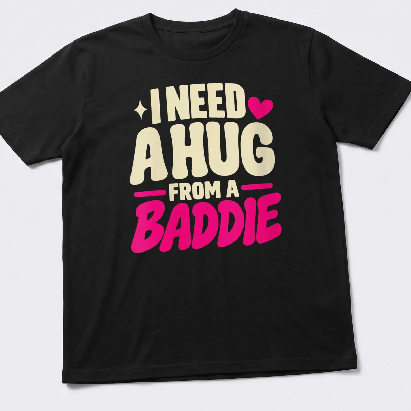Text-based slogan t-shirt with bold lettering in cream and pink — printed on a unisex t-shirt