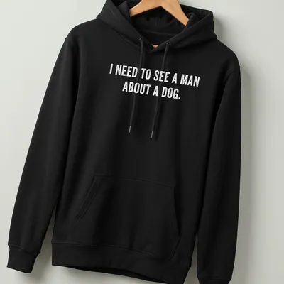 White bold typography t-shirt with humorous dog-related text — printed on a unisex hoodie