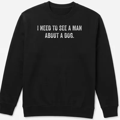 White bold typography t-shirt with humorous dog-related text — printed on a unisex sweatshirt