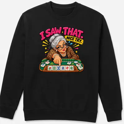 Colorful cartoon of a Mahjong player with text 'I SAW THAT. NICE TRY.' — printed on a unisex sweatshirt