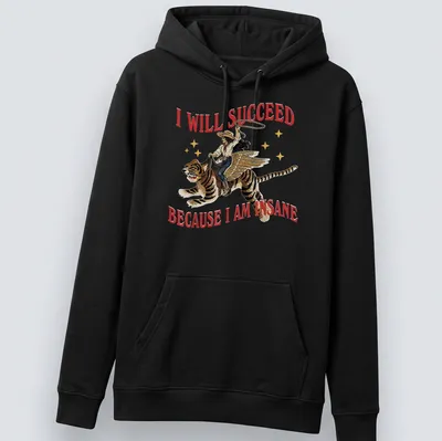 Vintage illustration of a cowgirl riding a tiger with bold text above — printed on a unisex hoodie