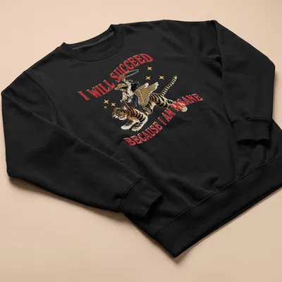 Vintage illustration of a cowgirl riding a tiger with bold text above — printed on a unisex sweatshirt