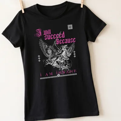 Gothic text 'I Will Succeed Because I Am Insane' with a winged warrior in pink and white. — printed on a women's shirt