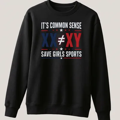 Bold graphic tee with text stating common sense and equality for girls in sports — printed on a unisex sweatshirt