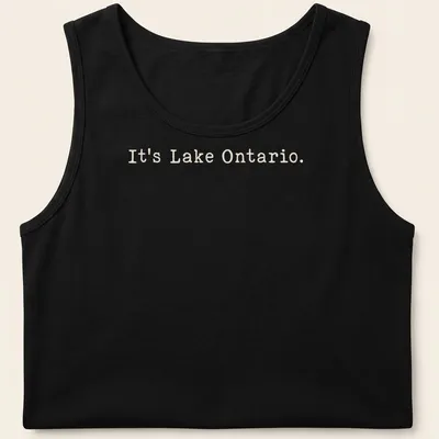 Typographic design featuring the phrase It's Lake Ontario on a beige background — printed on a tank top