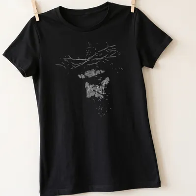 Abstract watercolor of Jesus Christ's face with a crown of thorns in white and light gray hues — printed on a women's shirt