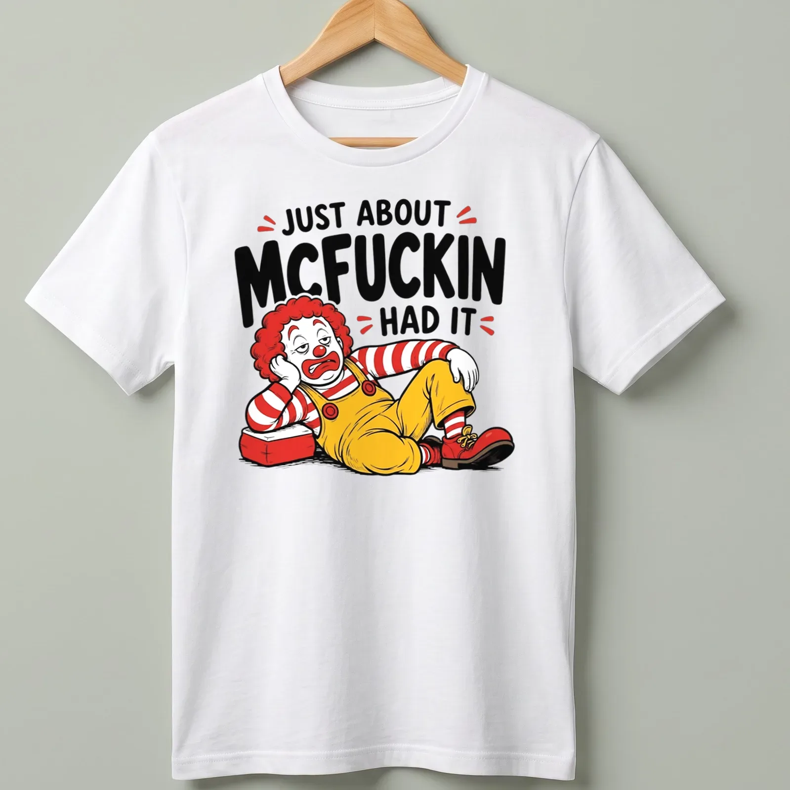 Cartoon clown graphic with the text 'Just About McFuckin Had It' in bold colors — printed on a unisex t-shirt