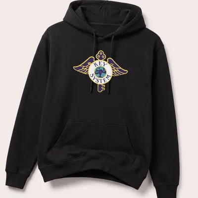 Bold graphic T-shirt featuring a winged key logo above a globe in vibrant colors — printed on a unisex hoodie