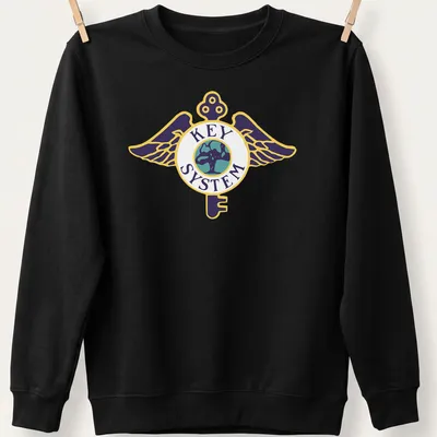 Bold graphic T-shirt featuring a winged key logo above a globe in vibrant colors — printed on a unisex sweatshirt