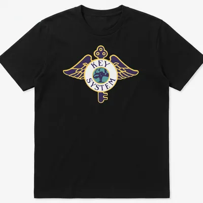 Bold graphic T-shirt featuring a winged key logo above a globe in vibrant colors