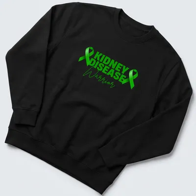 Bold modern design with the text 'KIDNEY DISEASE Warrior' and green awareness ribbons — printed on a unisex sweatshirt