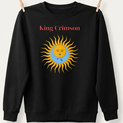 Colorful illustration of a sun with a face and text above it — printed on a unisex sweatshirt