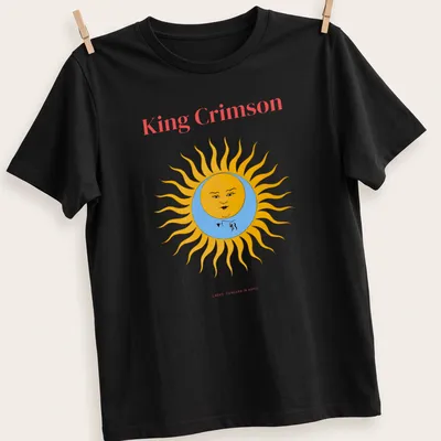 Colorful illustration of a sun with a face and text above it