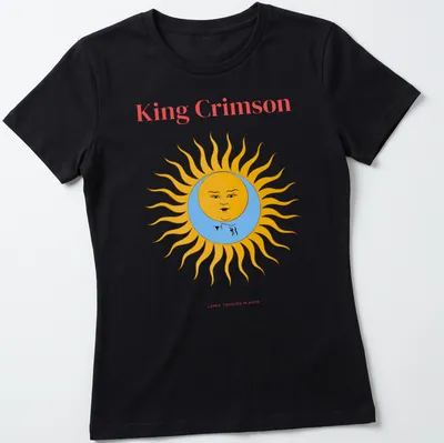 Colorful illustration of a sun with a face and text above it — printed on a women's shirt