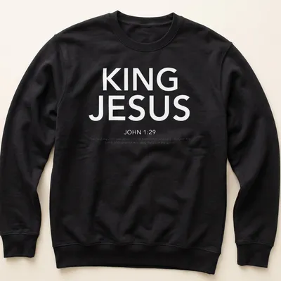 White text t-shirt featuring the words King Jesus John 129 in a bold design — printed on a unisex sweatshirt