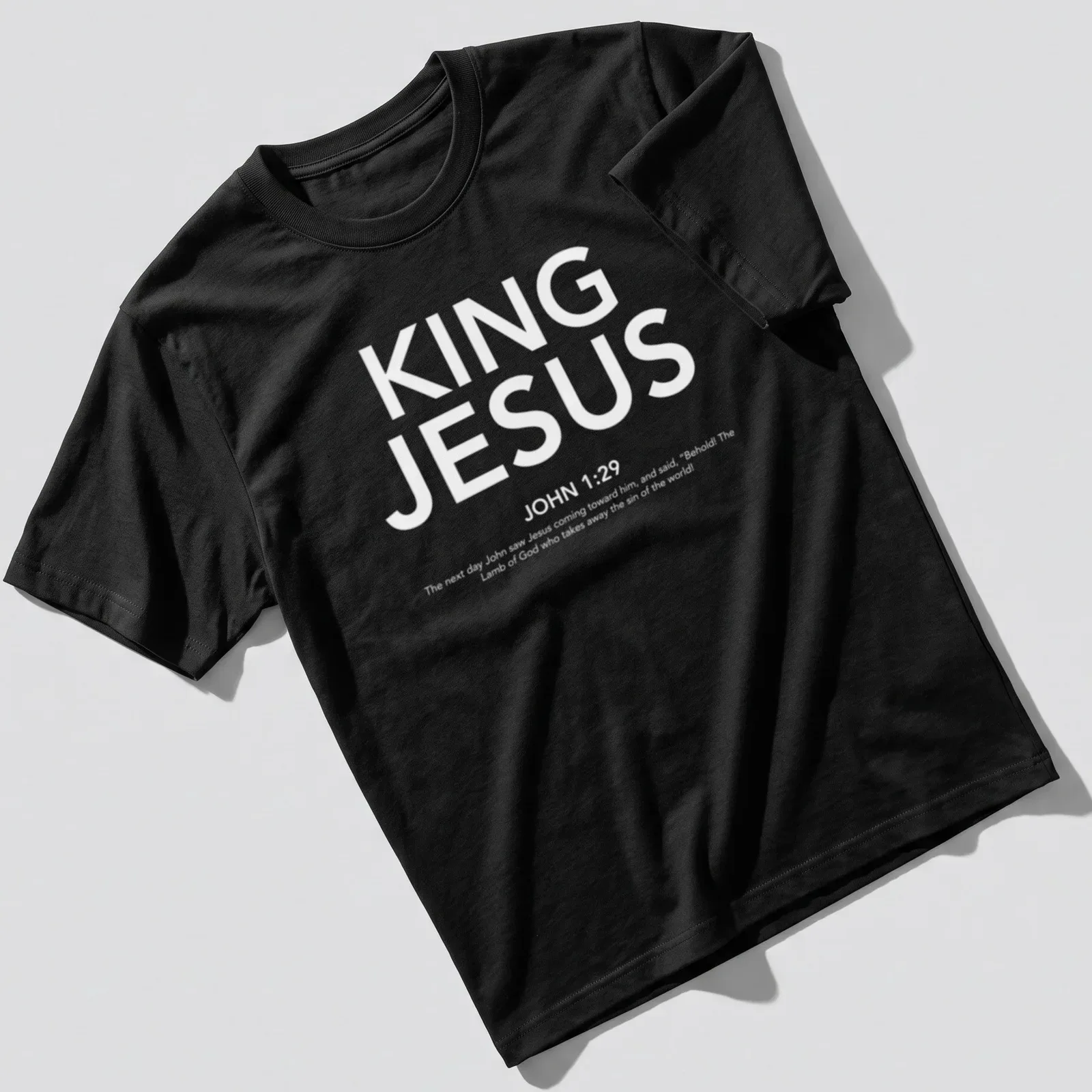 White text t-shirt featuring the words King Jesus John 129 in a bold design — printed on a unisex t-shirt