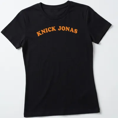 Bold typography of Knick Jonas printed in orange with a basketball pun — printed on a women's shirt