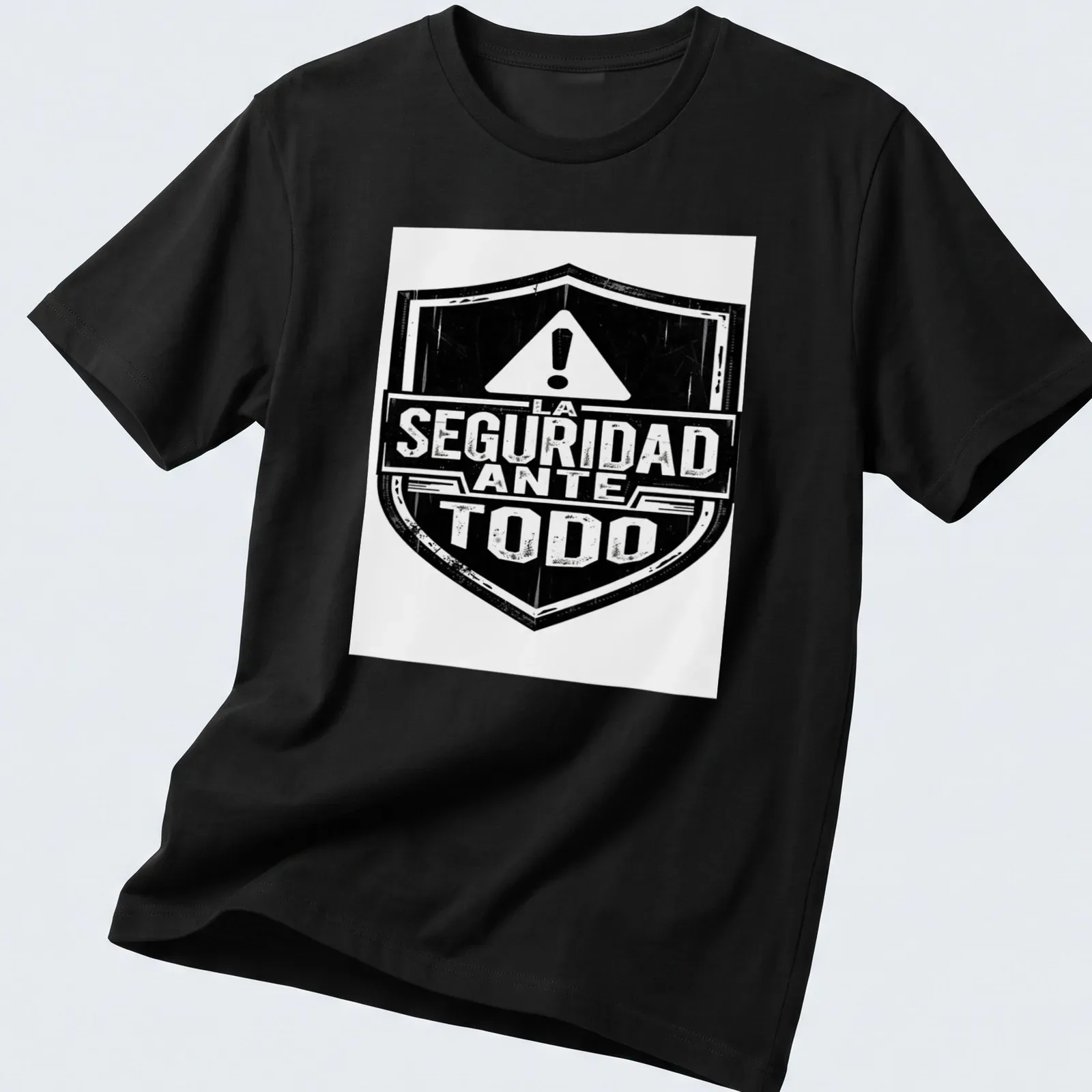 Vintage distressed t-shirt with a safety shield and text 'LA SEGURIDAD ANTE TODO' — printed on a unisex t-shirt