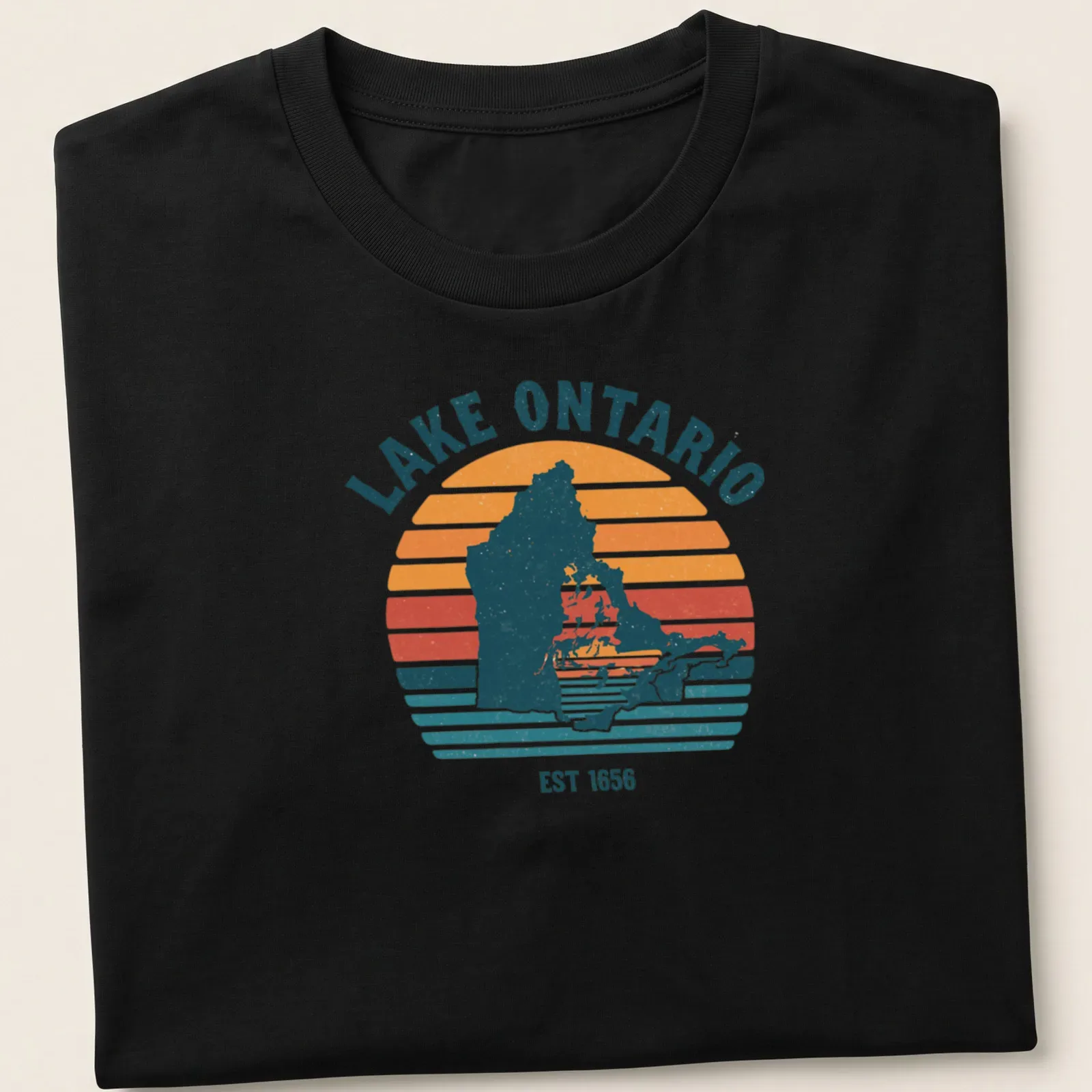 Retro striped Lake Ontario map t-shirt with historical text — printed on a unisex t-shirt