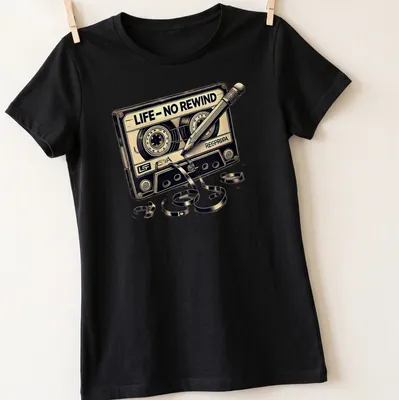 Vintage cassette tape T-shirt with nostalgic text in black and gold — printed on a women's shirt