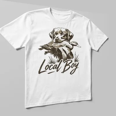 Vintage print of a dog with a duck, featuring the text 'Local Boy' above the graphic — printed on a unisex t-shirt (angled view)