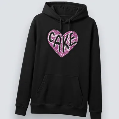 Glittery Love Cake t-shirt featuring a heart design in pink, black, and white — printed on a unisex hoodie
