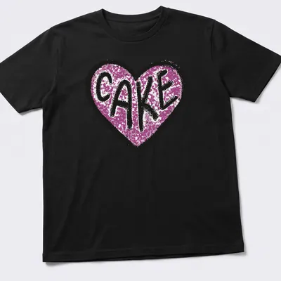 Glittery Love Cake t-shirt featuring a heart design in pink, black, and white