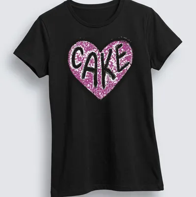 Glittery Love Cake t-shirt featuring a heart design in pink, black, and white — printed on a women's shirt