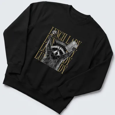 Black and white graphic of a raccoon with bold gold text saying Lunch Lady — printed on a unisex sweatshirt